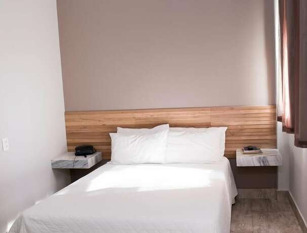 Imagen de la habitación del Hotel Fenicia Palace, Varginha. Foto 32