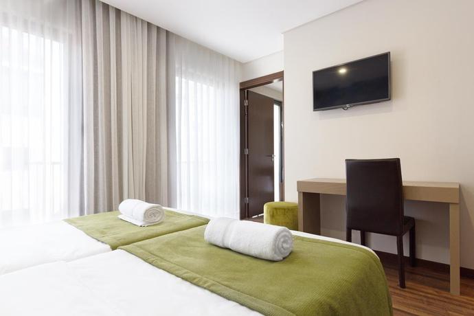 Imagen de la habitación del Hotel Fenicius Charme. Foto 10