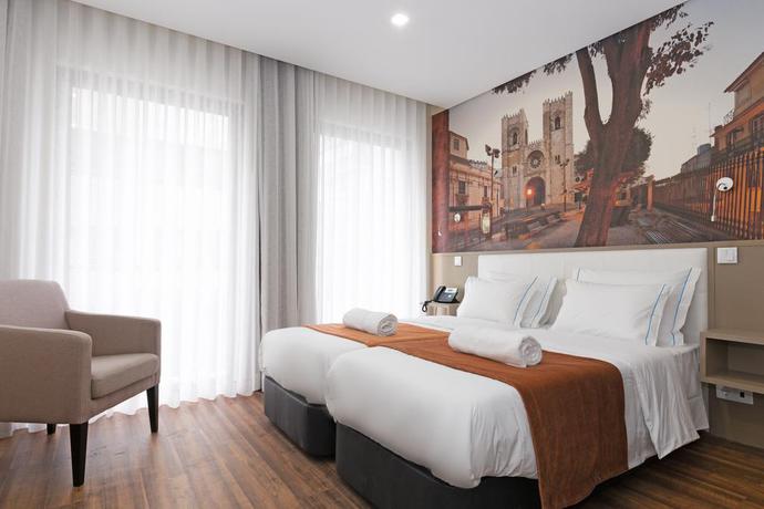 Imagen de la habitación del Hotel Fenicius Charme. Foto 11