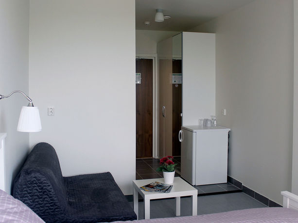 Imagen de la habitación del Hotel Fenix Inn. Foto 9