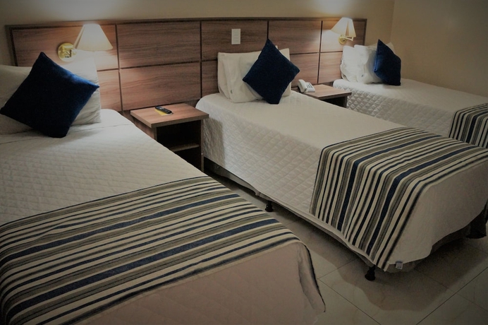 Imagen de la habitación del Hotel Fenix Pouso Alegre. Foto 8
