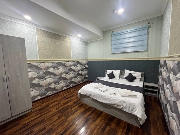Imagen de la habitación del Hotel Fenix, Taskent. Foto 17