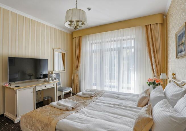 Imagen de la habitación del Hotel Fenix Town. Foto 12