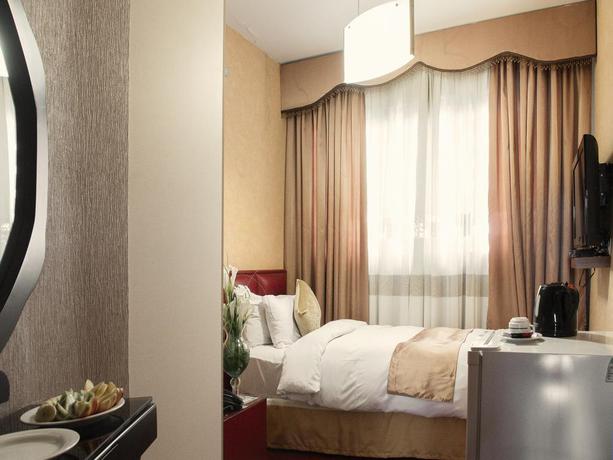 Imagen de la habitación del Hotel Ferdowsi International Grand. Foto 9