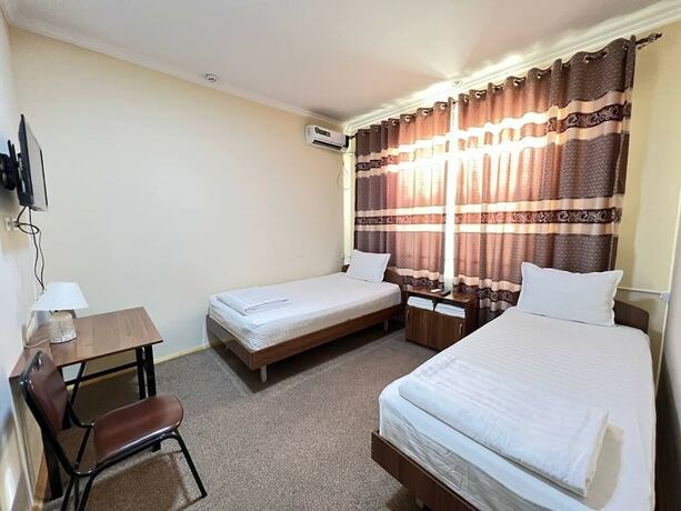 Imagen de la habitación del Hotel Fergana. Foto 14