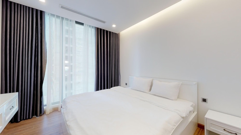 Imagen de la habitación del Hotel Feria Home - Vinhomes Metropolis Lieu Giai. Foto 8
