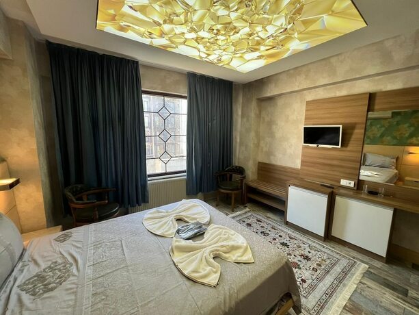 Imagen de la habitación del Hotel Feridiye. Foto 19