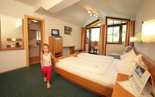 Imagen de la habitación del Hotel Feriendorf Ponyhof. Foto 11