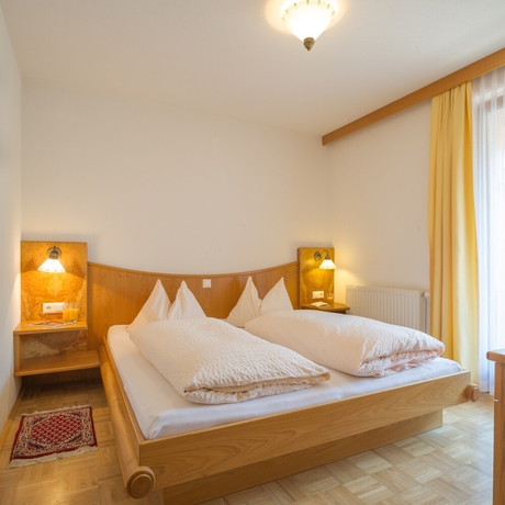 Imagen de la habitación del Hotel Ferienhof Neusacher Moser. Foto 4