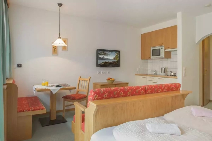 Imagen de la habitación del Hotel Ferienhof Neusacher Moser. Foto 13