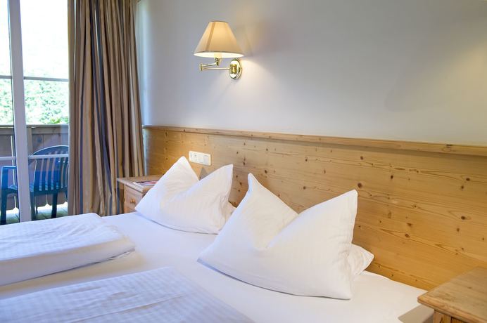 Imagen de la habitación del Hotel Ferienhotel Alpenhof. Foto 11