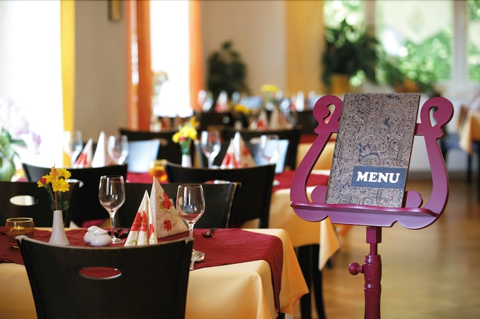Imagen del bar/restaurante del Hotel Ferienhotel Haus Am Ahorn. Foto 4