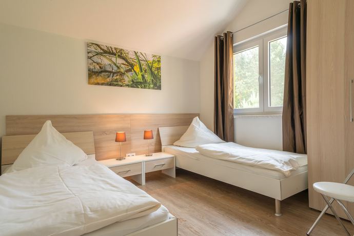 Imagen de la habitación del Hotel Ferienpark R&uuml;bezahl am M&uuml;ggelsee. Foto 11
