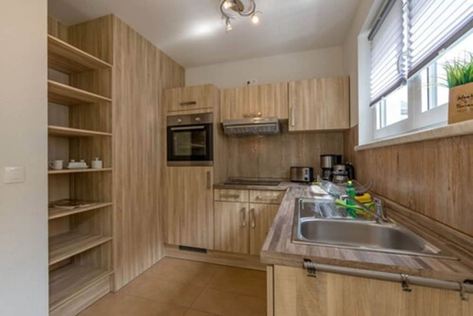 Imagen de la habitación del Hotel Ferienpark R&uuml;bezahl am M&uuml;ggelsee. Foto 13