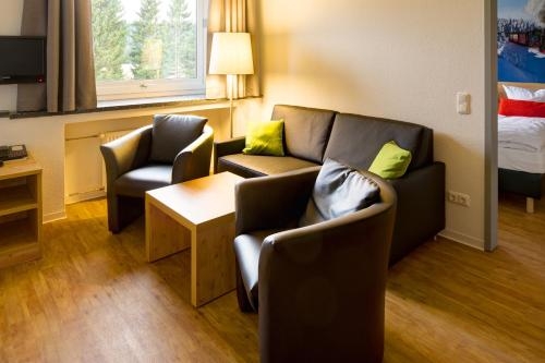 Imagen de la habitación del Hotel Ferienwohnanlage Brockenblick. Foto 6