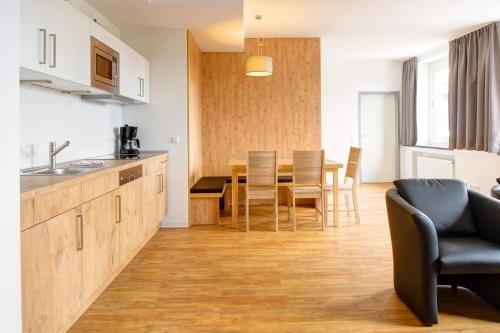 Imagen de la habitación del Hotel Ferienwohnanlage Brockenblick. Foto 7