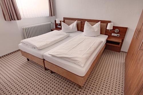 Imagen de la habitación del Hotel Ferienwohnanlage Brockenblick. Foto 9