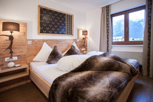 Imagen de la habitación del Hotel Ferienwohnungen Alpenherz. Foto 8