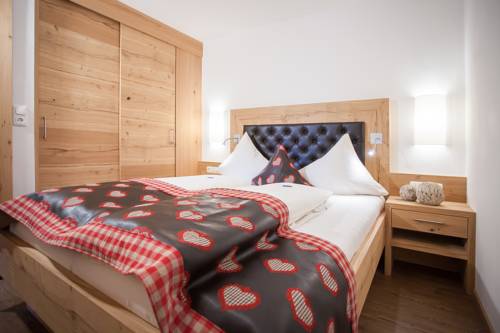 Imagen de la habitación del Hotel Ferienwohnungen Alpenherz. Foto 12