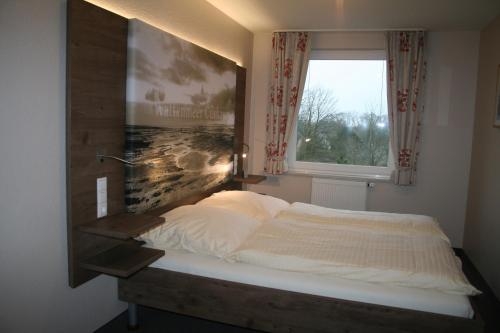 Imagen de la habitación del Hotel Ferienwohnungen Auf Der D&uuml;ne. Foto 9
