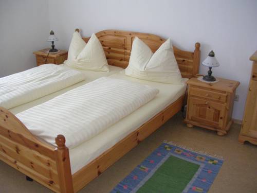 Imagen de la habitación del Hotel Ferienwohnungen Garni D&ouml;rflerwirt. Foto 5