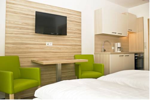 Imagen de la habitación del Hotel Ferienwohnungen Kristan. Foto 12