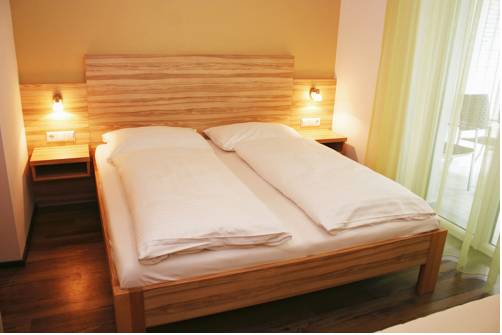 Imagen de la habitación del Hotel Ferienwohnungen Kristan. Foto 16