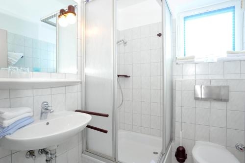 Imagen de la habitación del Hotel Ferienzentrum Wenningstedt. Foto 6