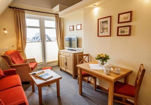 Imagen de la habitación del Hotel Ferienzentrum Wenningstedt. Foto 10