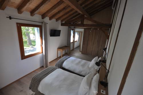 Imagen de la habitación del Hotel Ferme du Lignon. Foto 4