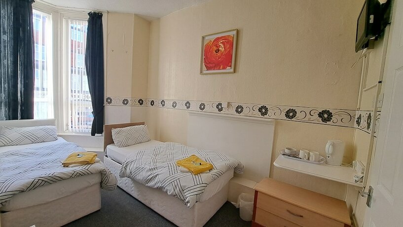 Imagen de la habitación del Hotel Fern Villa. Foto 18