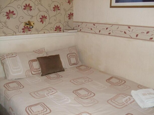 Imagen de la habitación del Hotel Fern Villa. Foto 19