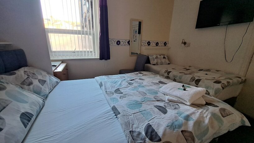 Imagen de la habitación del Hotel Fern Villa. Foto 20