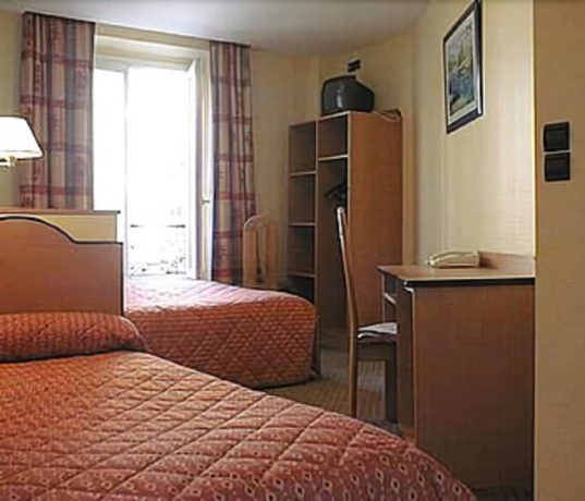 Imagen de la habitación del Hotel Ferney République. Foto 12