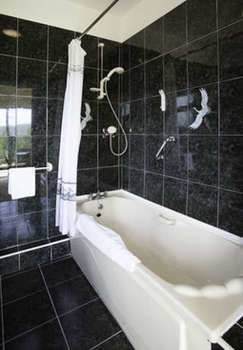 Imagen del bar/restaurante del Hotel Fernhill Golf and Country Club. Foto 3