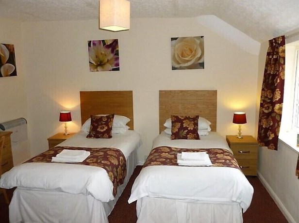 Imagen de la habitación del Hotel Ferns Farm and Palms Leisure Club. Foto 9