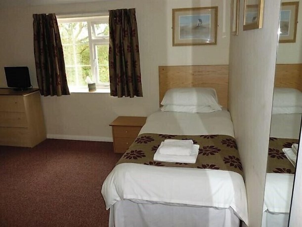 Imagen de la habitación del Hotel Ferns Farm and Palms Leisure Club. Foto 15