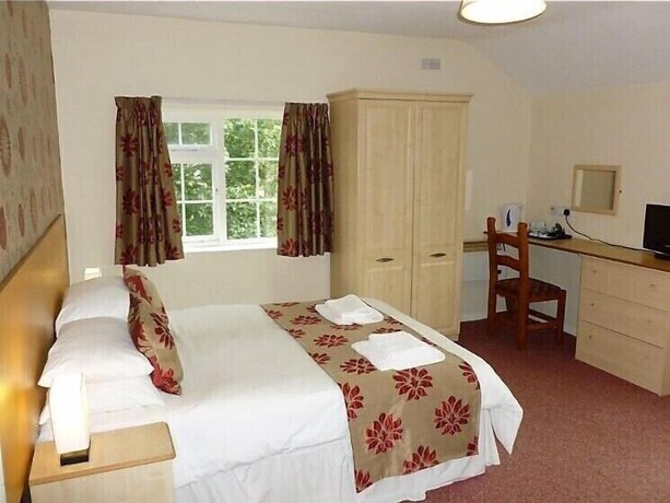 Imagen de la habitación del Hotel Ferns Farm and Palms Leisure Club. Foto 17