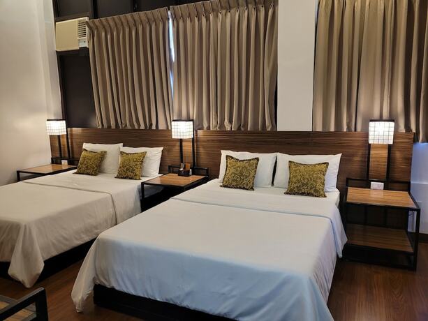 Imagen de la habitación del Hotel Fernvale Leisure Club and Resort. Foto 18