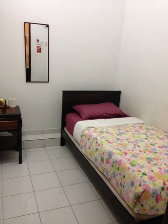 Imagen de la habitación del Hotel Ferringhi Heritage Budget. Foto 1