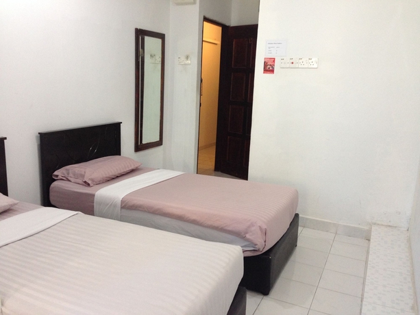 Imagen de la habitación del Hotel Ferringhi Heritage Budget. Foto 2