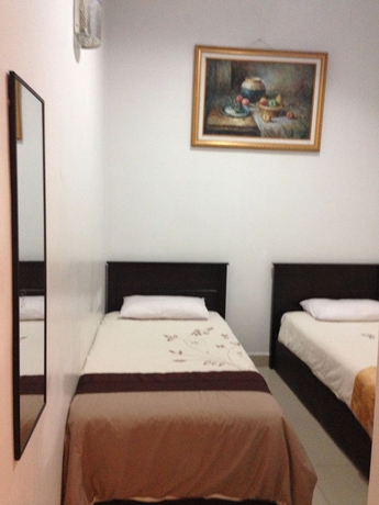 Imagen de la habitación del Hotel Ferringhi Heritage Budget. Foto 3