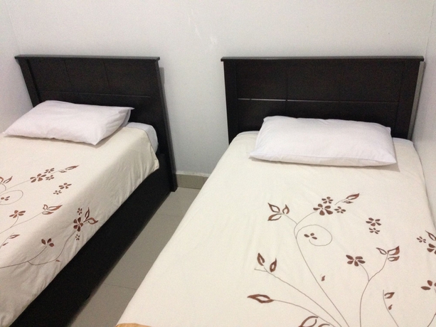 Imagen de la habitación del Hotel Ferringhi Heritage Budget. Foto 7