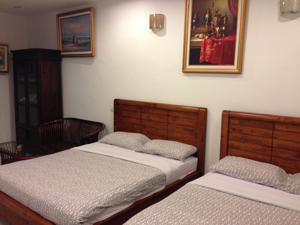 Imagen de la habitación del Hotel Ferringhi Heritage Budget. Foto 11