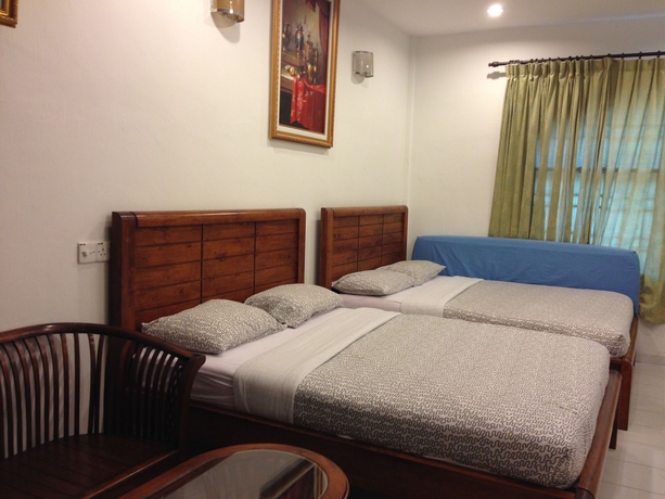 Imagen de la habitación del Hotel Ferringhi Heritage Budget. Foto 15