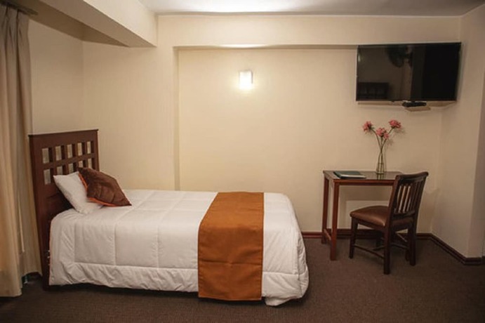 Imagen de la habitación del Hotel Ferrua. Foto 14