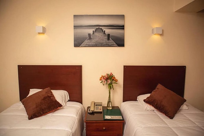Imagen de la habitación del Hotel Ferrua. Foto 15