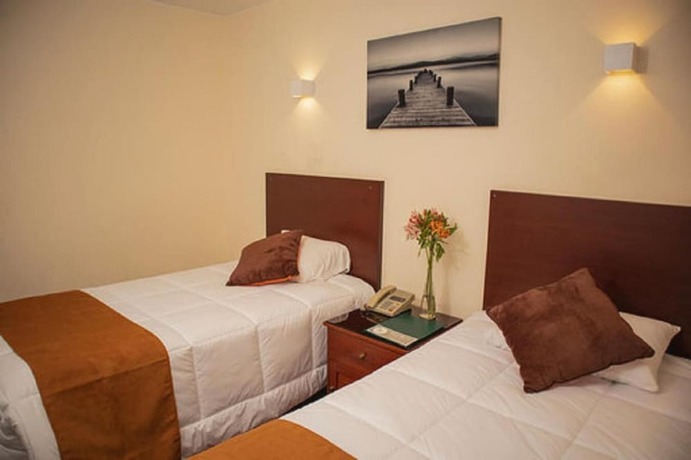Imagen de la habitación del Hotel Ferrua. Foto 16