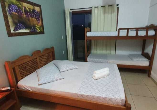 Imagen de la habitación del Hotel Ferrugem Eco Village. Foto 8