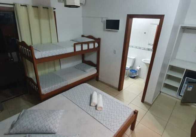 Imagen de la habitación del Hotel Ferrugem Eco Village. Foto 9